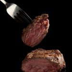 juicy steak with fork